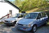 My mum's 94 RVR (blue) next to Jeze..